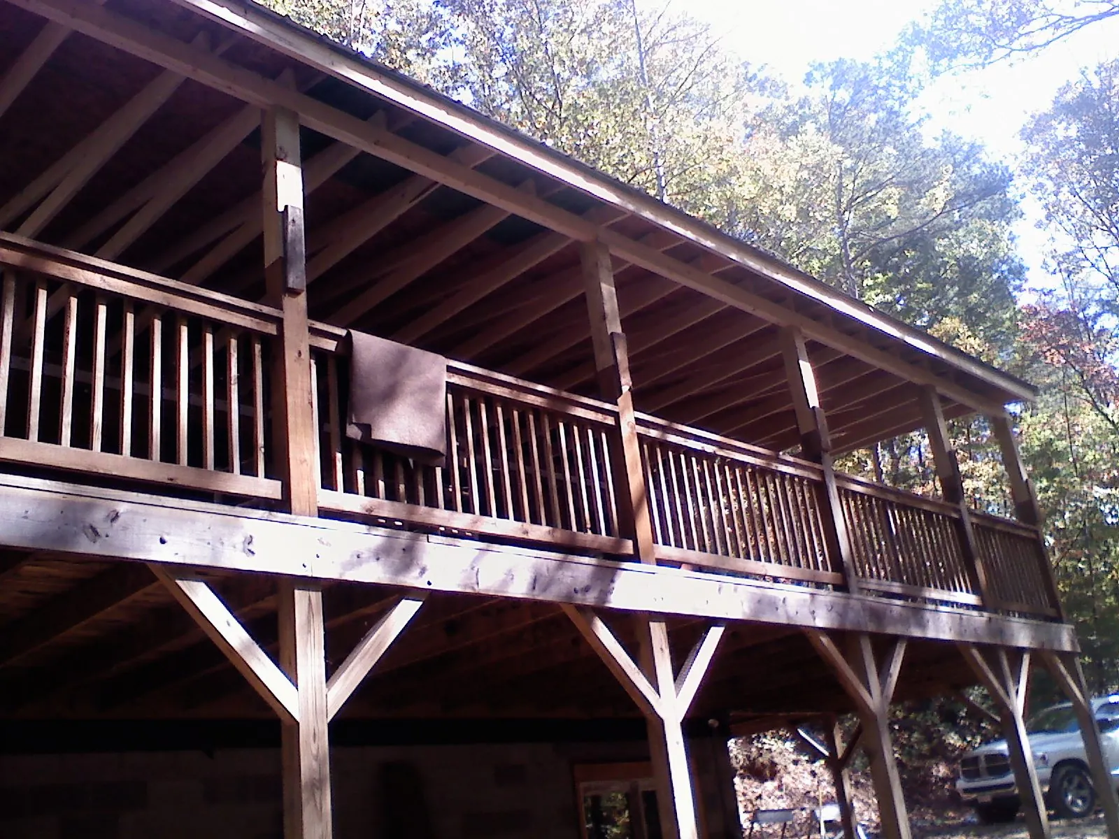 Timber framing under a new elevated porch and deck — Roof Leak Repair in College Place by Roofing Brothers